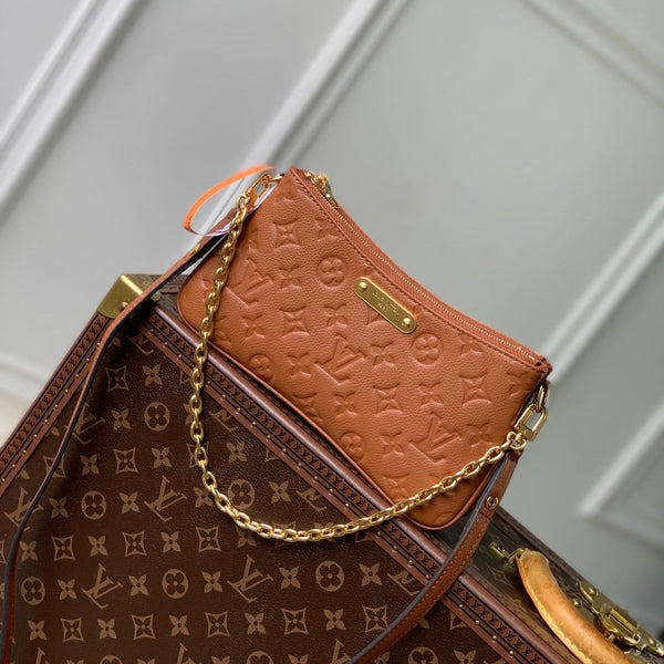 LIV POCHETTE BAG 24 IN COGNAC BROWN MONOGRAM EMPREINTE LEATHER